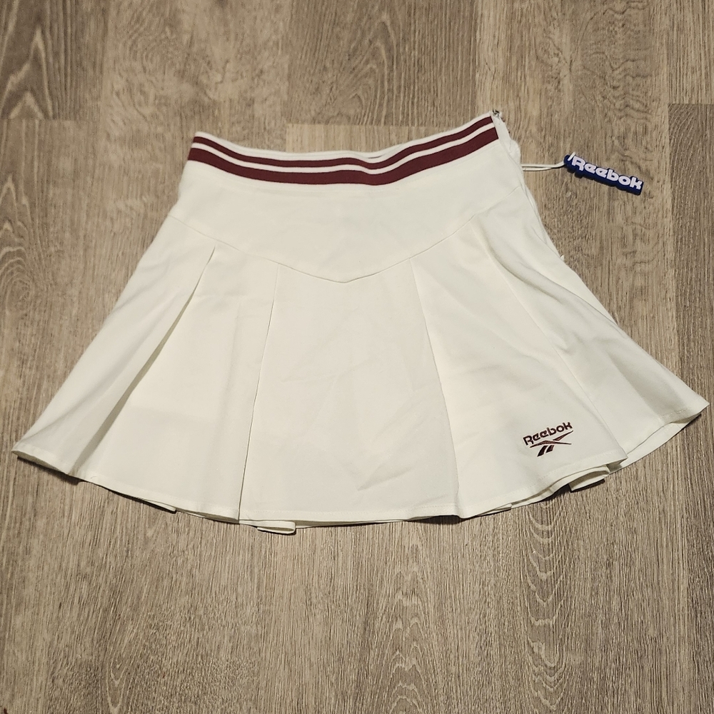 reebok white tennis skirt with built in shorts limited edition. Never worn!